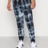 Grosses soldes 🎉 Meilleure qualité YOURTURN MONOCHROME TIE DYE JOGGER UNISEX - Pantalon de survêtement trouser Haute all ❤️ -YOURTURN Soldes 2022 0edc31c01d024468a27152acd4fe8944 scaled
