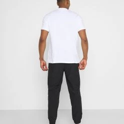 Acheter 🤩 YOURTURN Bon Rapport Coût-Efficacité UNISEX - Pantalon de survêtement trouser Normale all ✨ -YOURTURN Soldes 2022 84d2f3ac913541f9b4e3212b19786e01 scaled